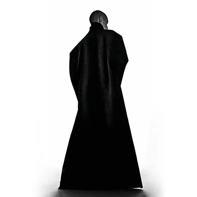 Oversized black coat silhouette, minimal, editorial, monochrome