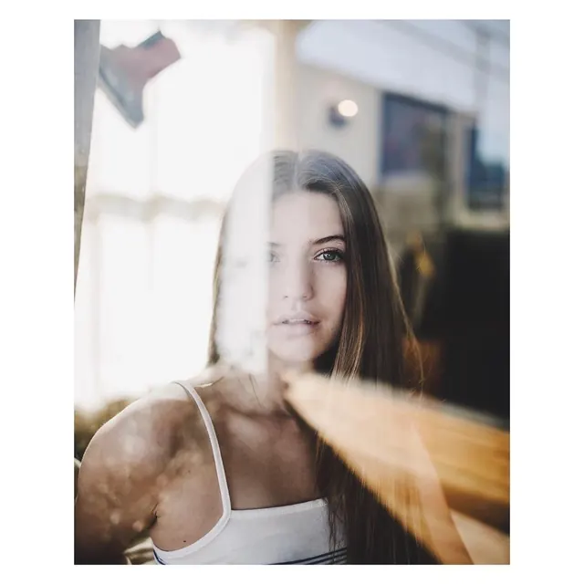 Window reflection portrait, photographic, editorial, light