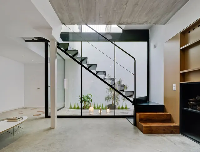 Concrete house with indoor courtyard, minimal, technical, muted