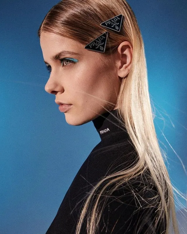 Prada profile with blue eyeliner, luxury, editorial, cool