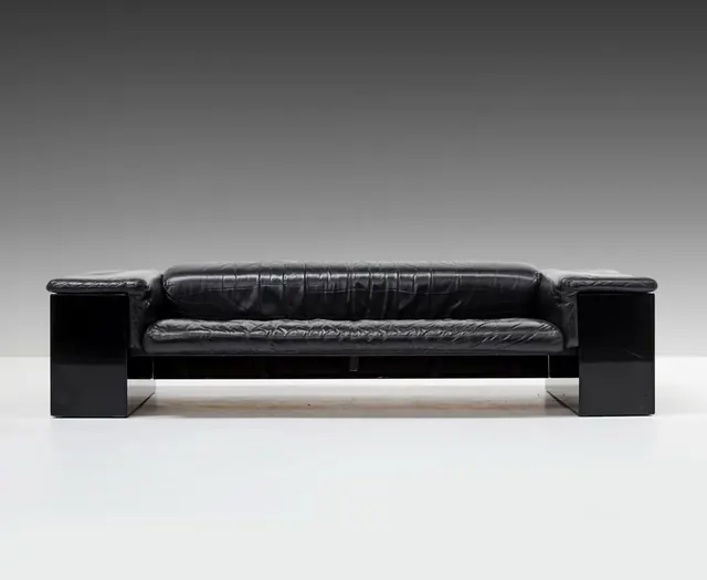 Black leather modernist sofa, minimal, luxury, dark