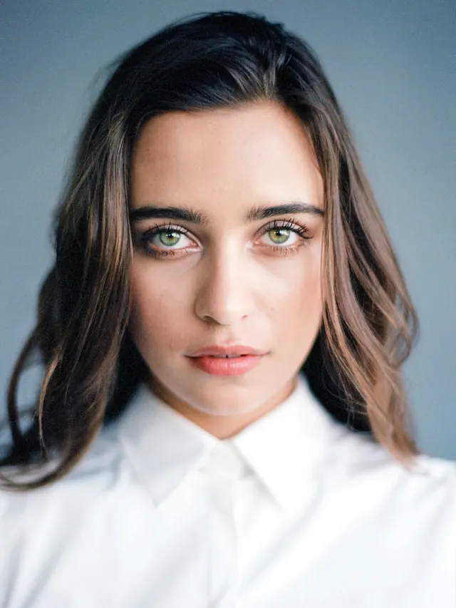 Green-eyed portrait white shirt, minimal, photographic, cool