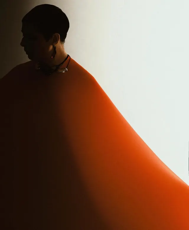 Silhouette with Orange Veil