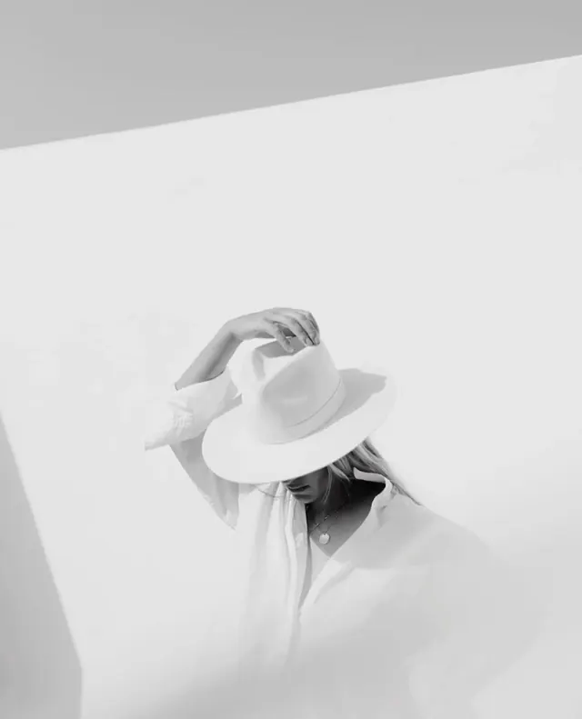 Monochrome Portrait with Wide-Brimmed Hat