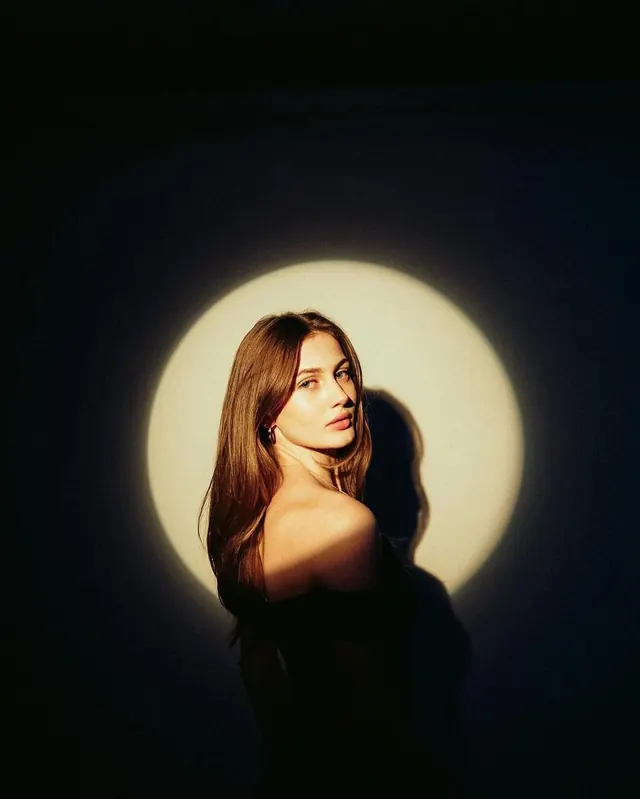 Woman in Circular Spotlight
