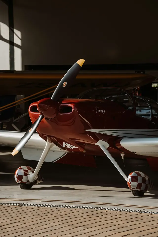 Red Aircraft in Hangar