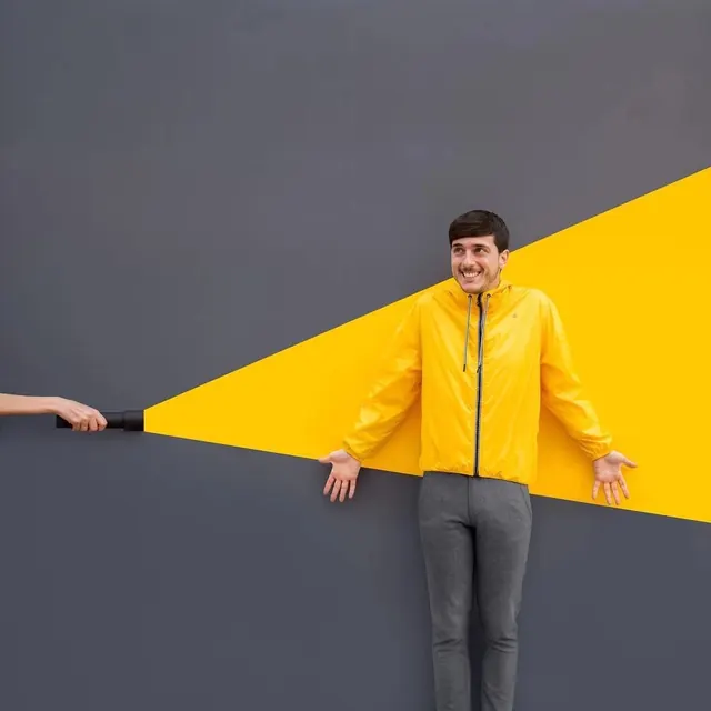 Man in Yellow Jacket with Geometric Background