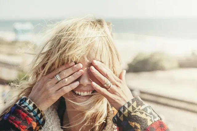 Woman on Beach with Rings