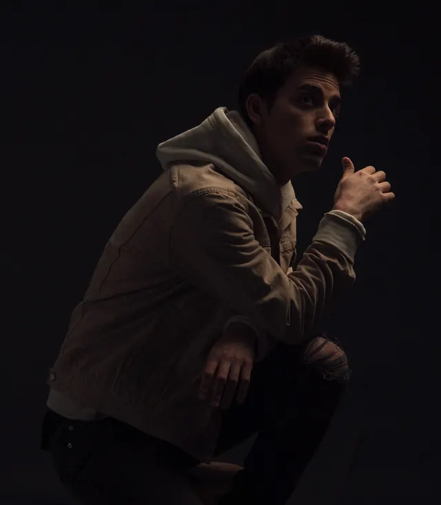 Man in Hooded Jacket Portrait