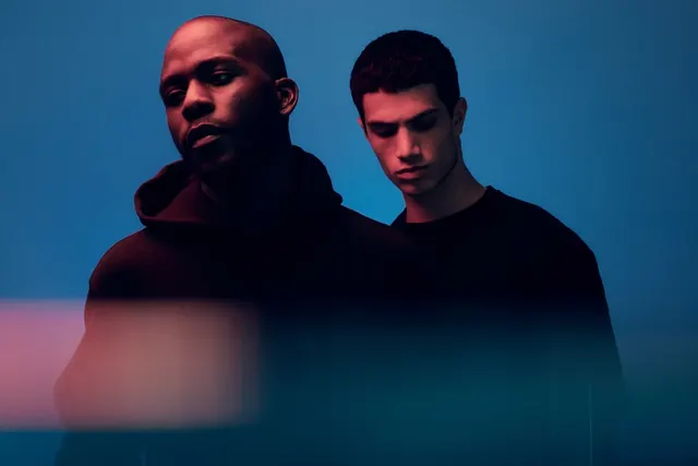 Portrait of Two Men in Blue Light