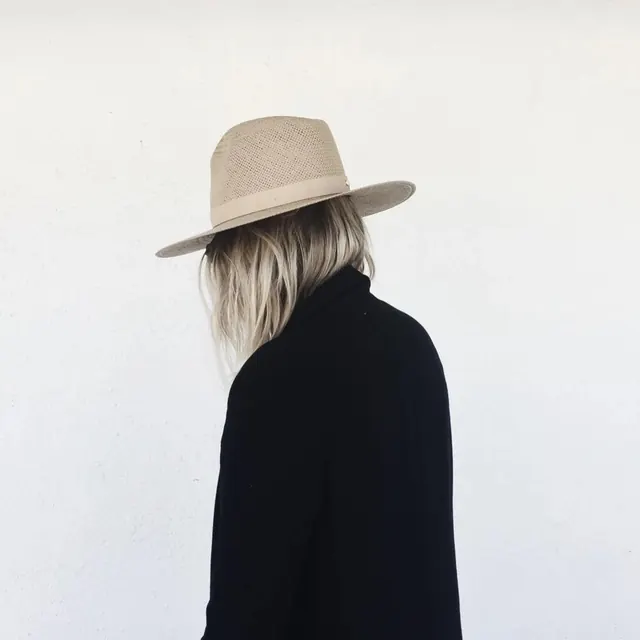 Minimalist Portrait with Wide-Brimmed Hat