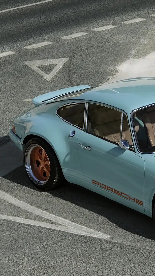 Blue Sports Car on Asphalt