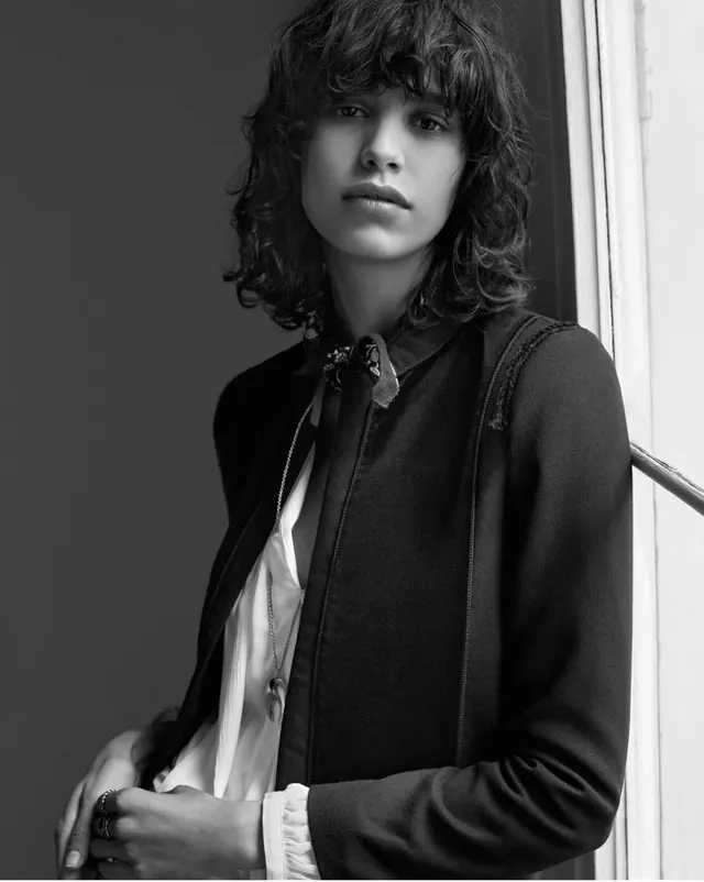 Monochrome Portrait of Woman in Layered Clothing