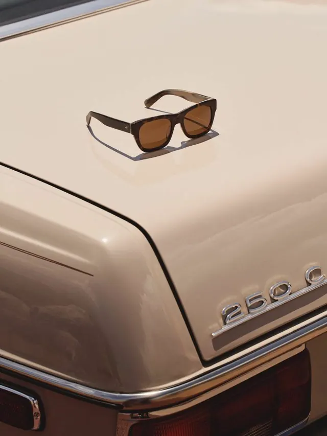 Vintage Sunglasses on Car Hood