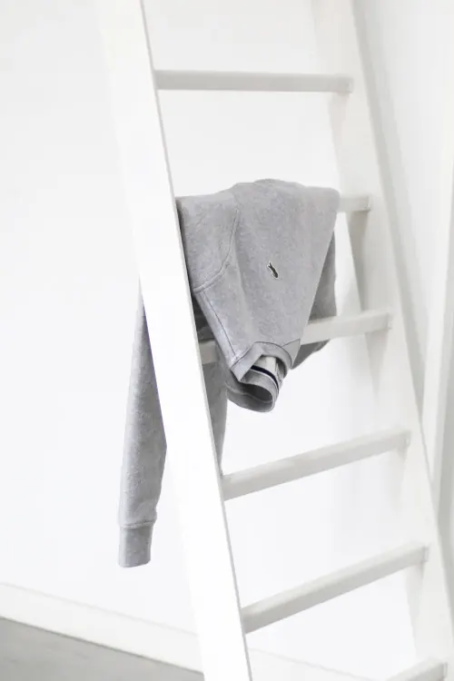 Grey Sweater on White Ladder