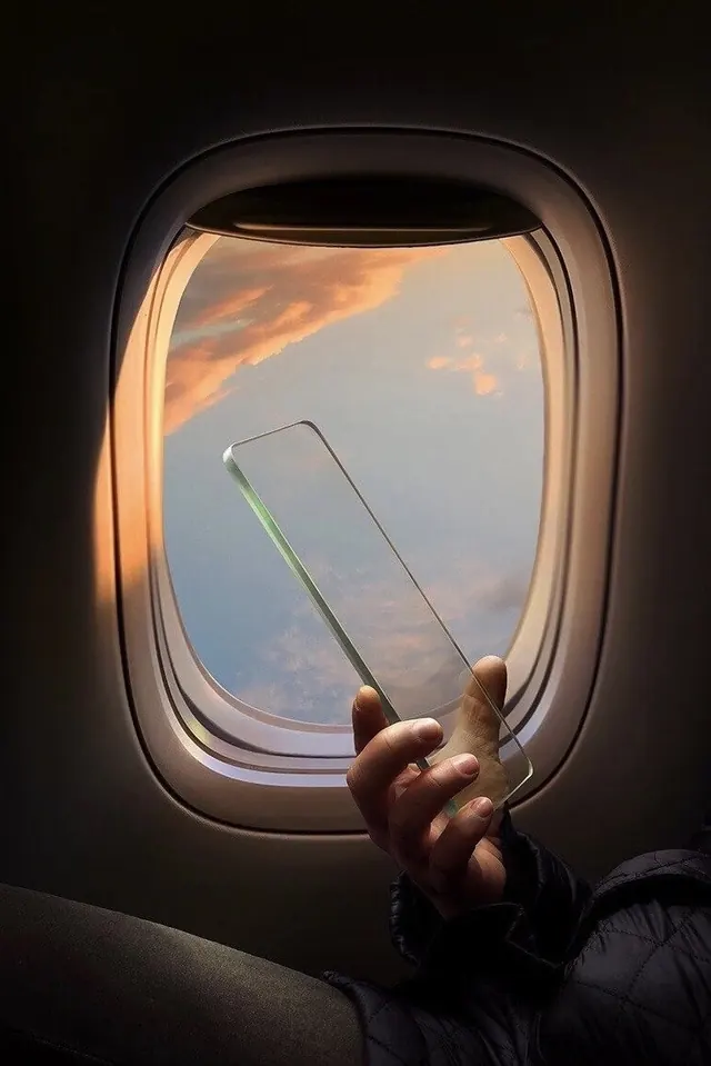 Airplane Window View with Smartphone