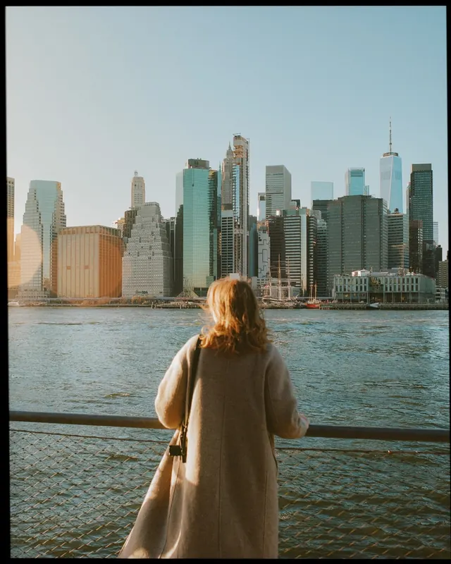 Woman overlooking city skyline