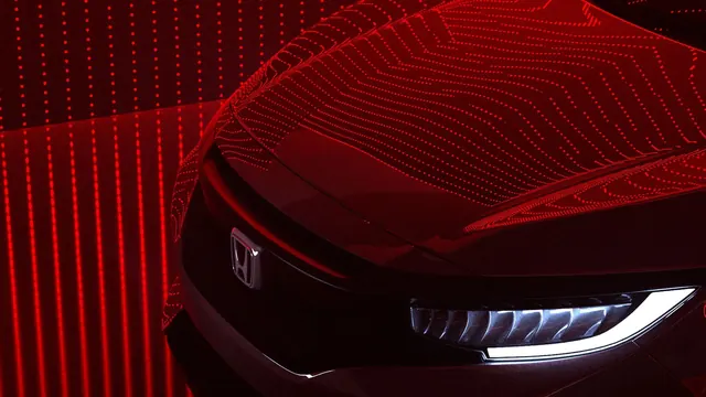 Red Car Headlight Close-up