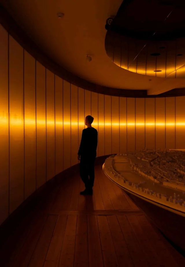 Curved Architectural Interior with Backlit Wall