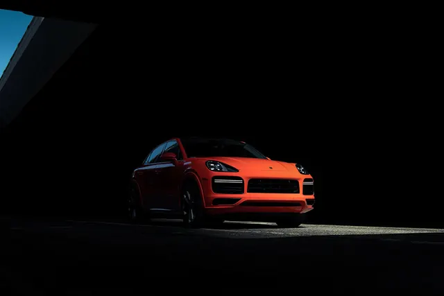 Orange Sports Car in Dark Studio