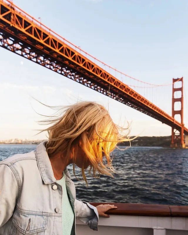 Woman on Ferry with Golden Hour Light