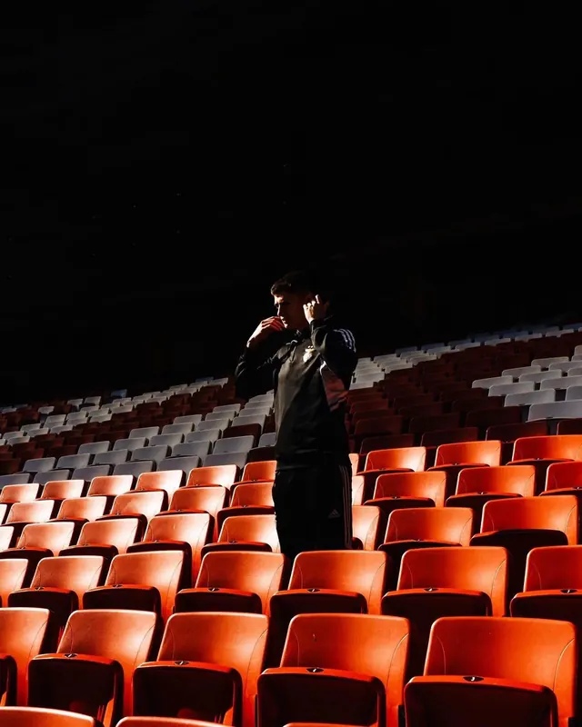 Person in Theater Seating