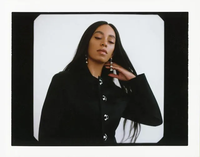 Portrait of a woman in black outerwear