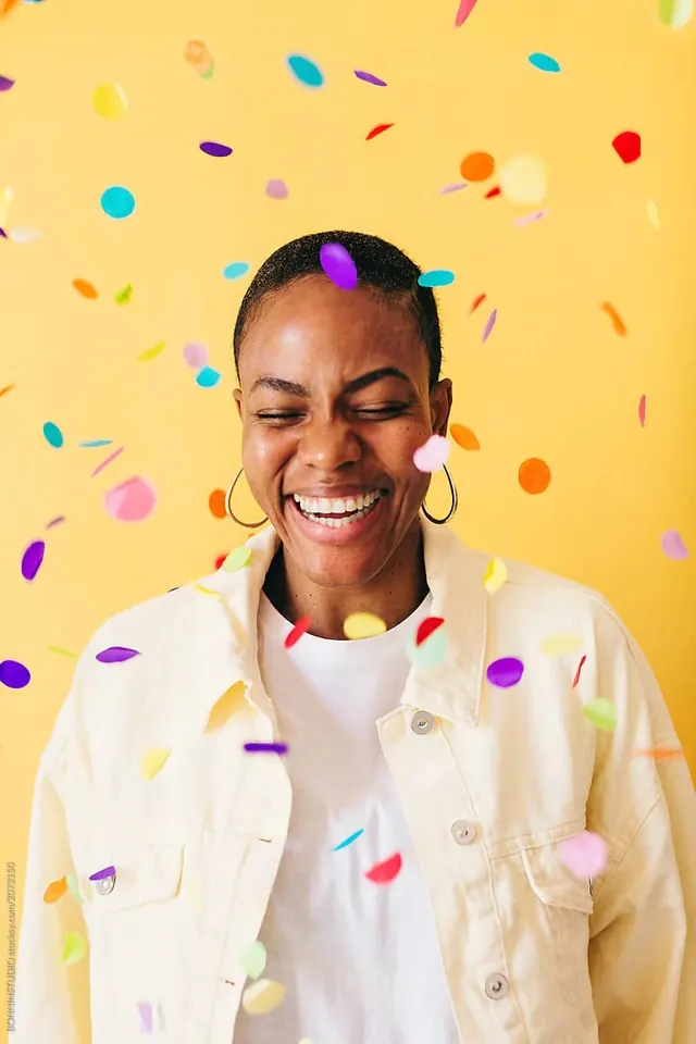 Smiling Woman with Confetti