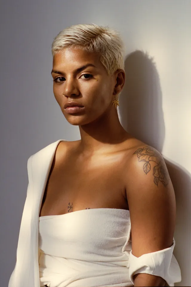 Portrait of a woman in white attire