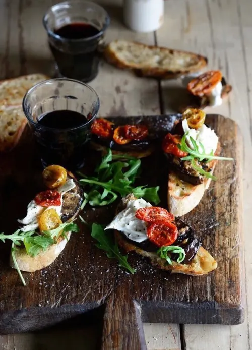 Gourmet Appetizers on Wooden Board