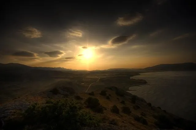 Sunset over Coastal Landscape
