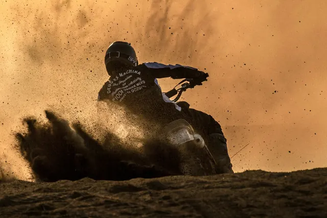 Motocross Rider in Dust