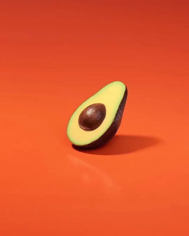 Avocado on Orange Background