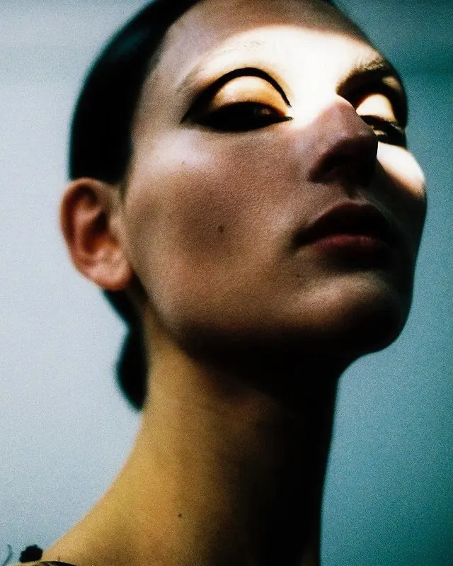 Portrait with warm undertones, photographic, editorial, warm