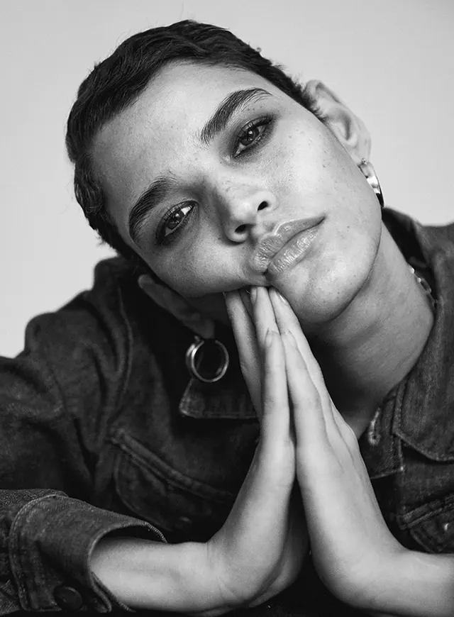 Black and white portrait study with coy expression, photographic, monochrome, monochrome