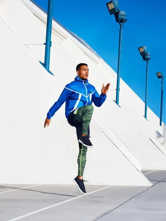 Athletic runner portrait on geometric background, photographic, technical, bright