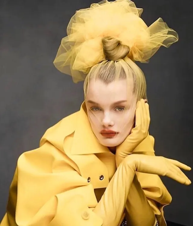 Yellow blazer and tulle bow portrait, photographic, playful, vibrant