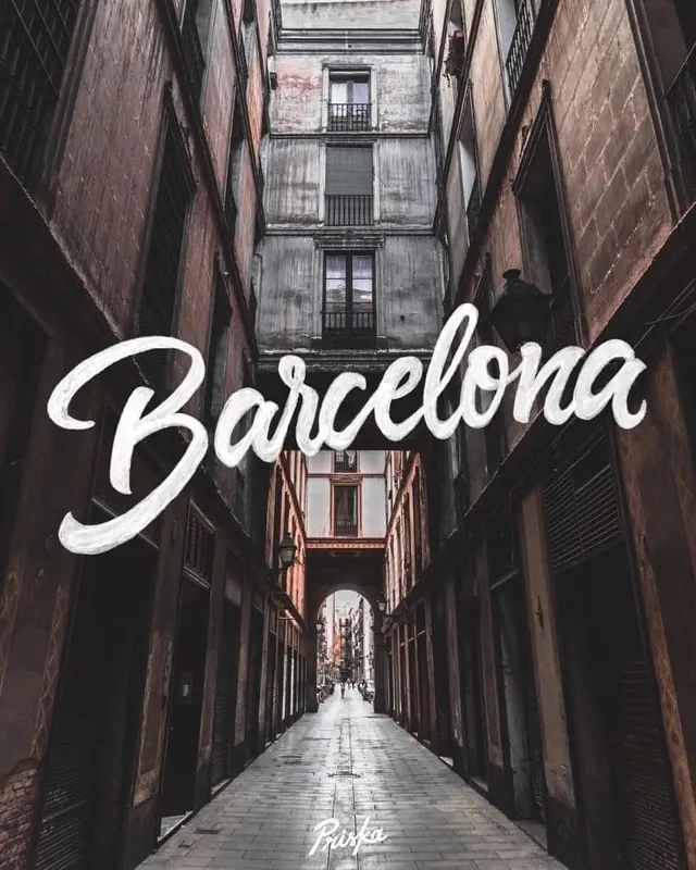 Barcelona script typography over alleyway, photographic, editorial, dark