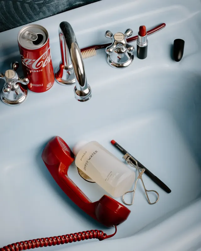 Beauty and lifestyle flatlay, photographic, playful, warm