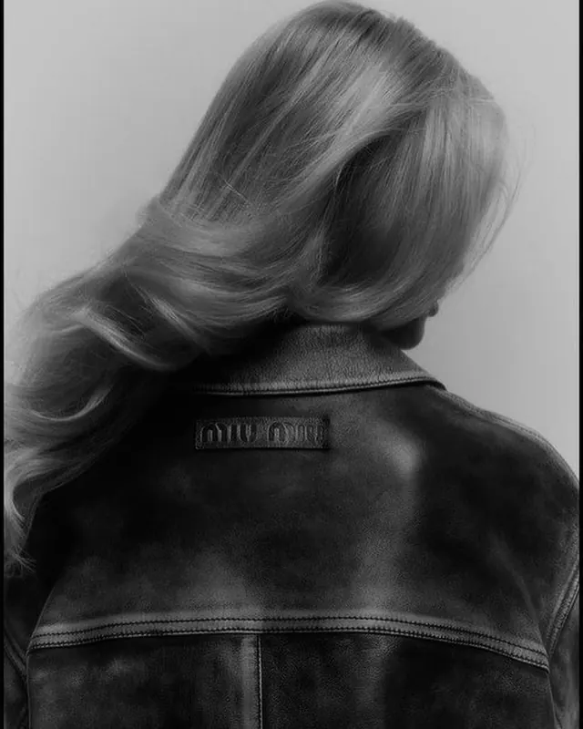 Black and white portrait with leather jacket, photographic, monochrome, dark