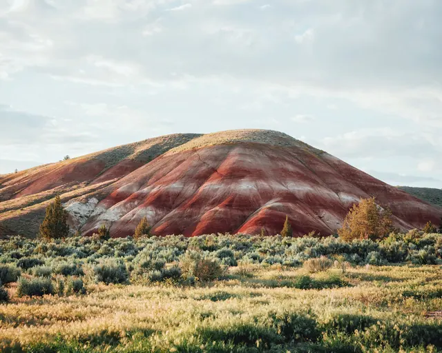 Painted hills geological formation, photographic, warm