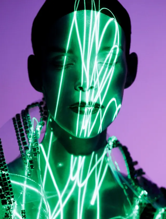 Neon face portrait on purple background, 3d-render, gradient-heavy, vibrant
