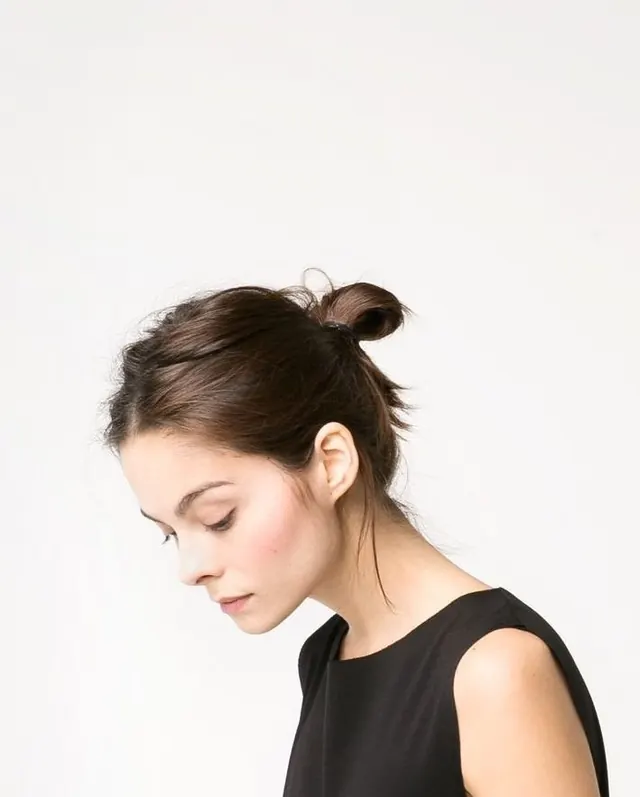 Portrait of a woman in a black dress
