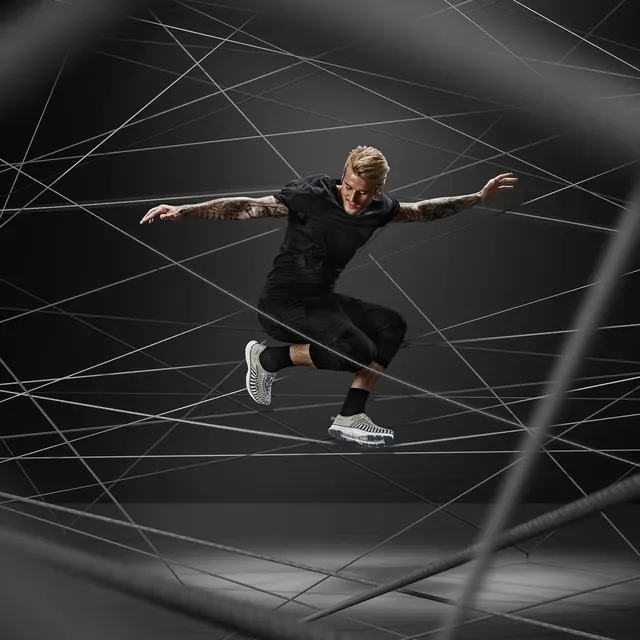 Athlete in Geometric Cage