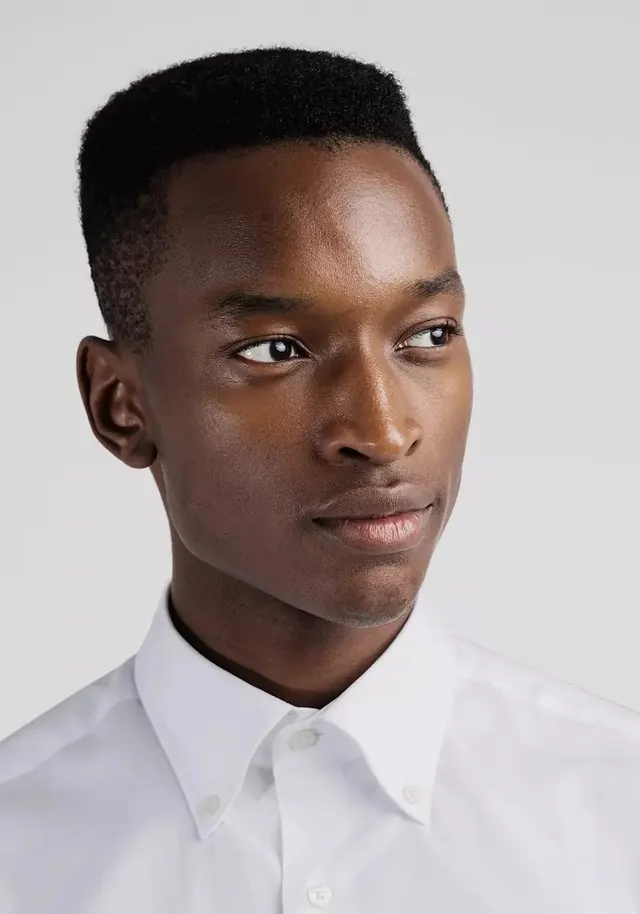 Portrait of a man in a white shirt