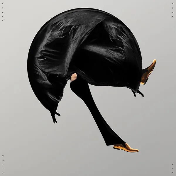 Abstract Figure in Black Fabric