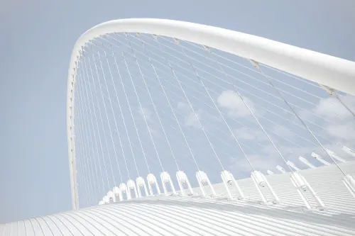White architectural canopy structure, minimal, geometric, light
