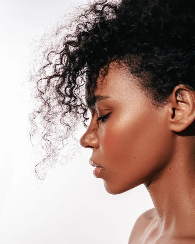Portrait of a Woman with Curly Hair