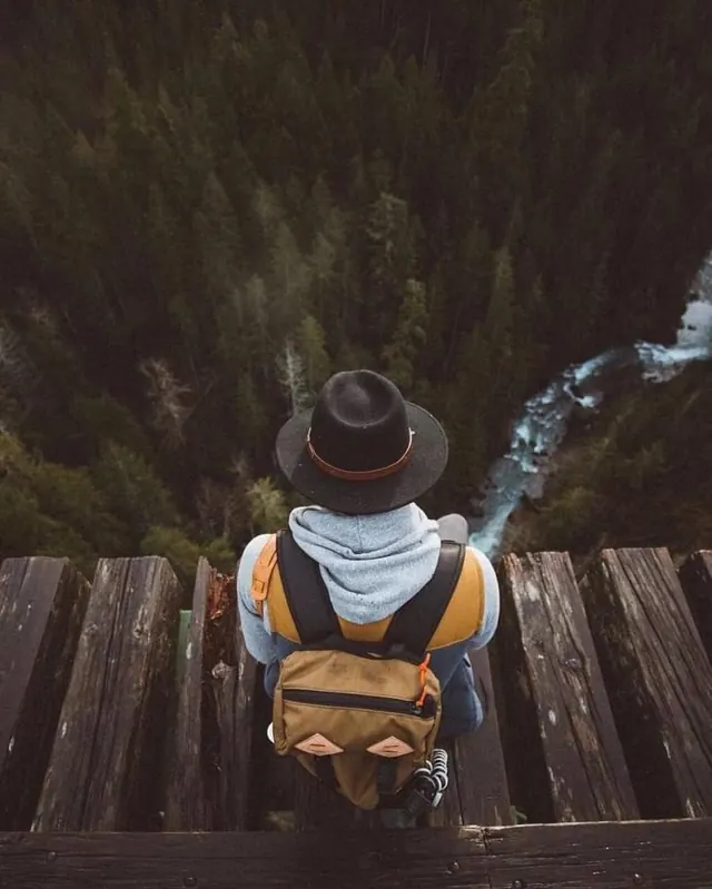 Hiker on Wooden Bridge