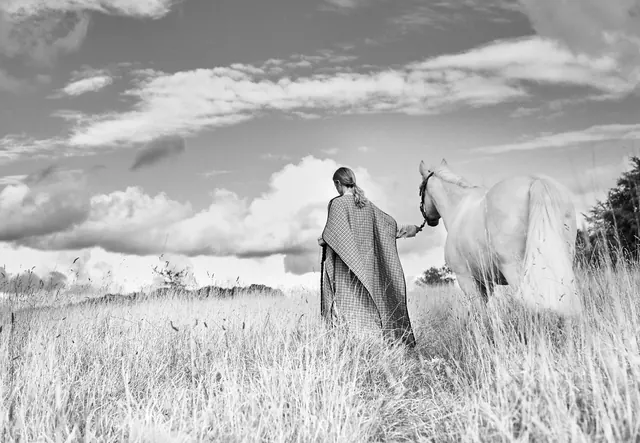 Woman with Horse in Field